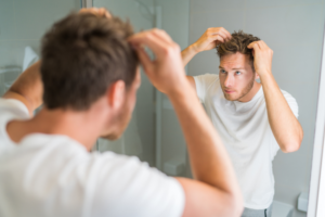 main in need of effective solutions for hair loss near Newton MA