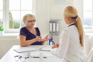 patient discussing non-surgical facelift cost in Quincy MA