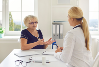 patient discussing non-surgical facelift cost in Quincy MA