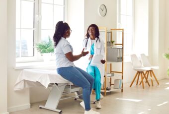 doctor discussing laser hair removal cost in Eastern Massachusetts