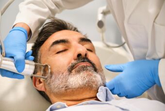 man getting acne scar treatments in Foxborough
