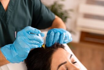 woman visiting a hair loss dermatologist in Stoughton