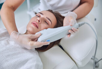 woman getting Sofwave for tighter skin without surgery