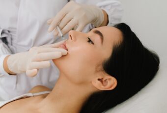 woman getting a tox lip flip near Boston