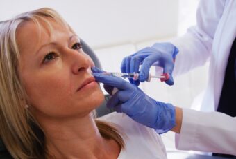 woman getting dermal filler near Boston